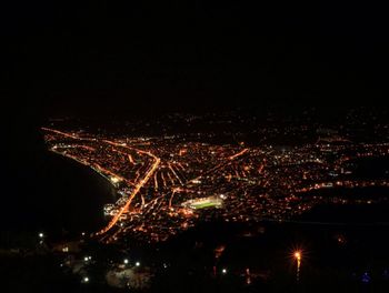 Aerial view of illuminated cityscape