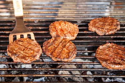 Frying in the open air in a charcoal burger for burgers on charcoal.