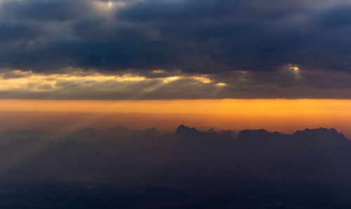 Scenic view of dramatic sky during sunset