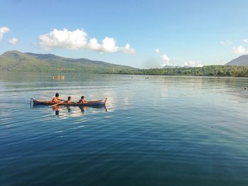 Tourists enjoying at lakeshore