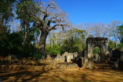 Old ruin building against blue sky