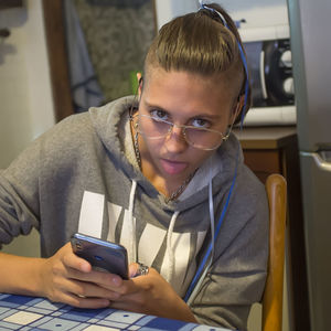 Young woman using phone