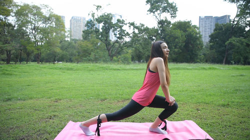 Full length of woman on field