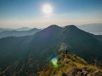 Scenic view of mountains against sky during sunset