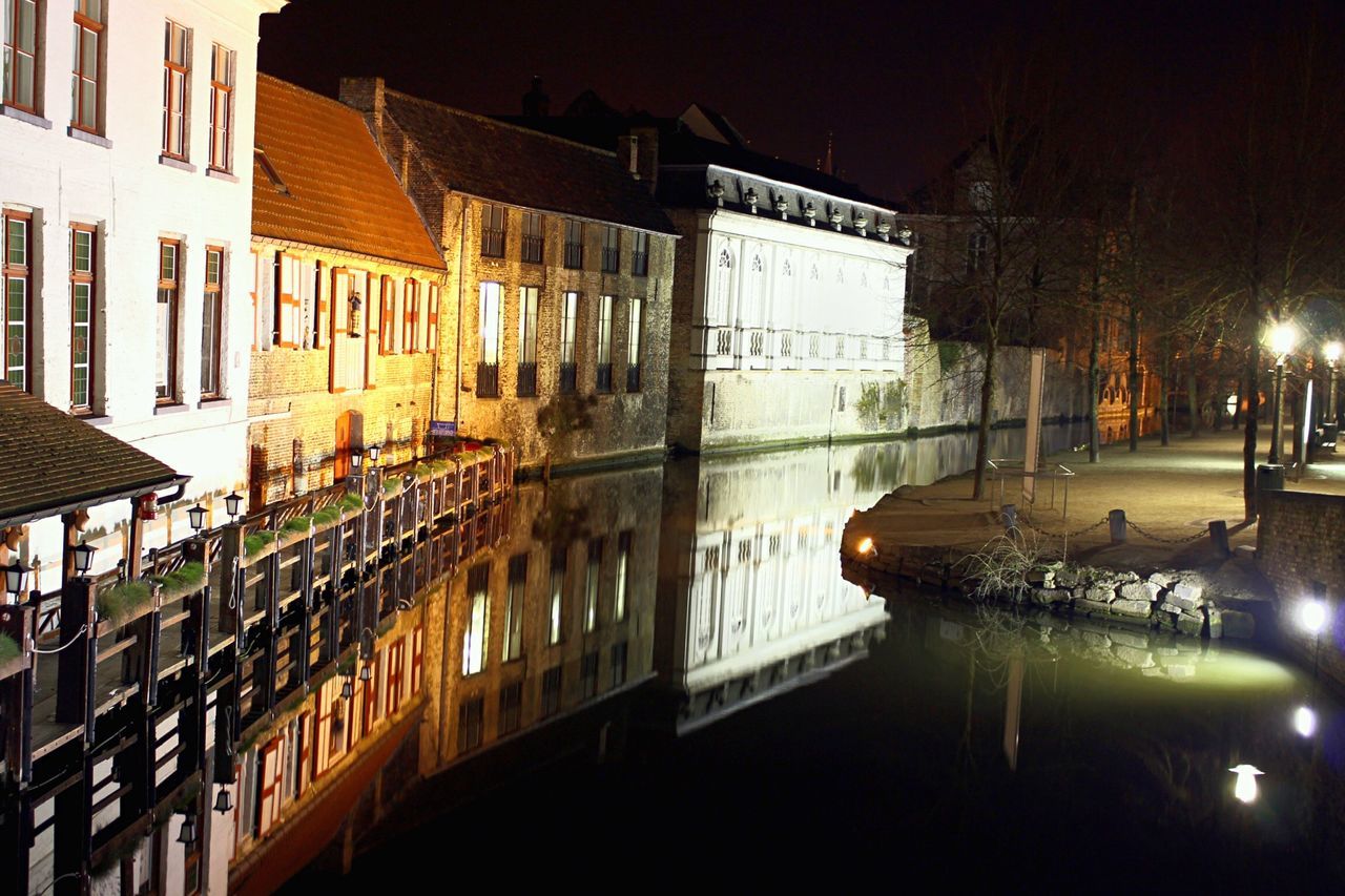 REFLECTION OF BUILDINGS IN WATER