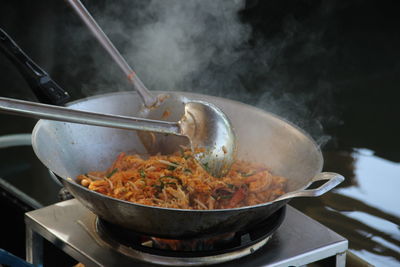 Close-up of meat in cooking pan