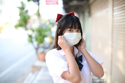 Portrait of woman wearing mask