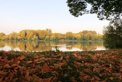 Scenic view of lake against sky during autumn