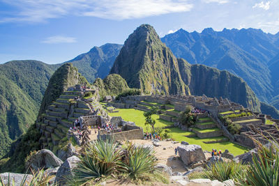 Scenic view of mountains against cloudy sky