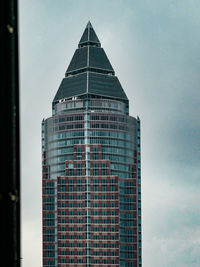 Low angle view of modern building against sky
