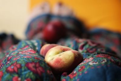 Close-up of peaches on legs