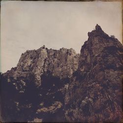 Scenic view of rock formations against sky