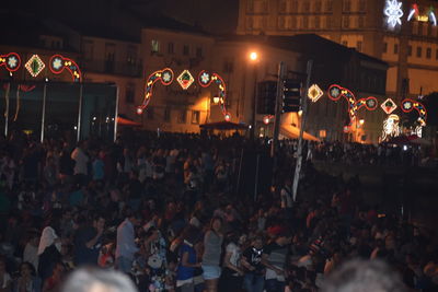 Group of people on street at night
