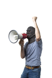 Full length of man standing against white background