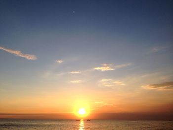 Scenic view of sea at sunset