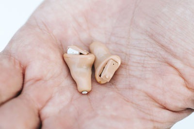 Close-up of person holding hands