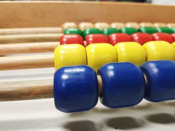 Close-up of multi colored pencils on table