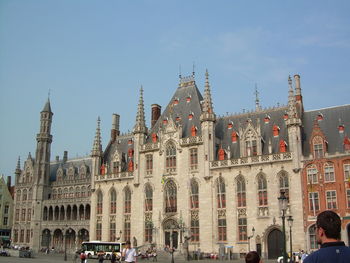 Tourists in front of building