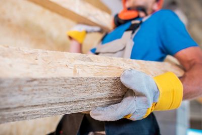 Close-up of man working on wood