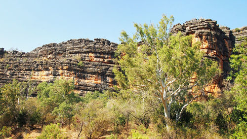 View of old ruin on landscape against clear sky