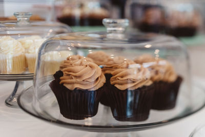 Close-up of cake on glass table