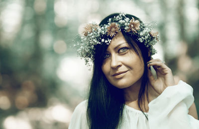 Portrait of young woman with eyes closed