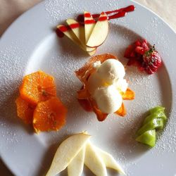 Close-up of dessert with fruits on plate