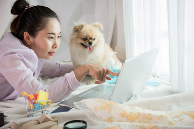 Portrait of woman with dog