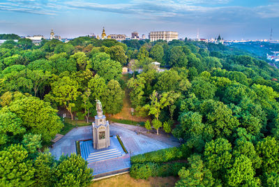 Panoramic view of trees and buildings against sky