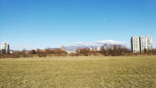 View of cityscape against clear sky