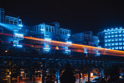 Illuminated buildings in city at night