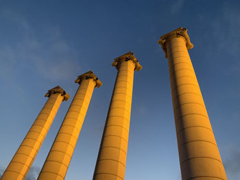 Low angle view of smoke stack against sky