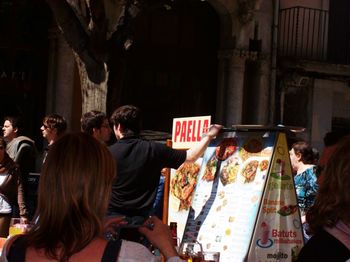 People at market stall