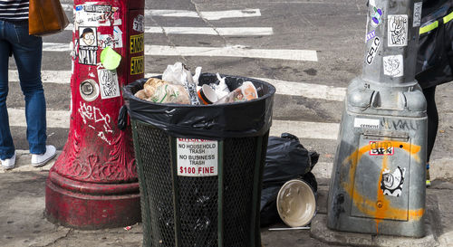 Man with garbage on road