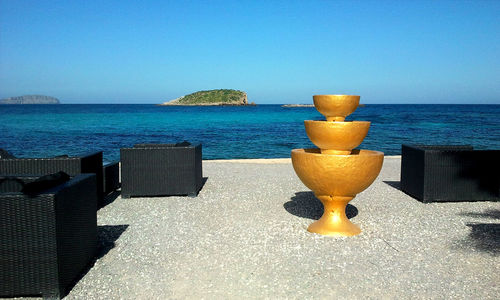 Scenic view of sea against blue sky