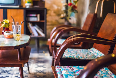 Empty chairs and tables in restaurant