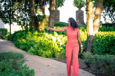 Full length of woman walking at park