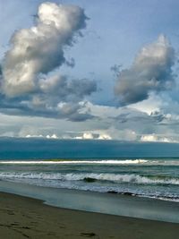 Scenic view of beach against sky