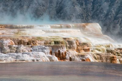 Colorful landscape of mineral deposits at canary hot springs in yellowstone national park, montana