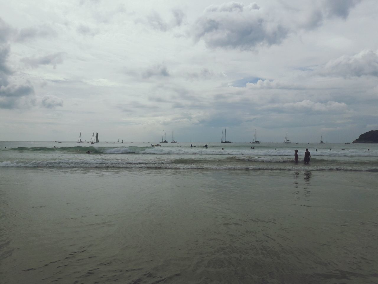 PANORAMIC VIEW OF BEACH AGAINST SKY