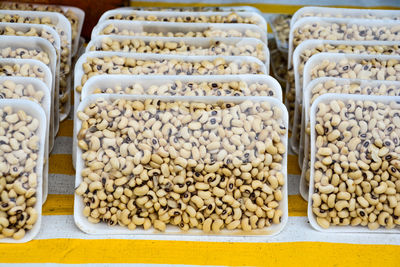 Beans in containers for sale at store