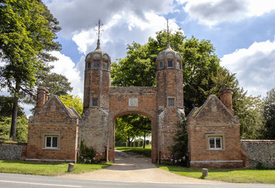 The gateway and lodges to melford hall in long melford, suffolk, uk