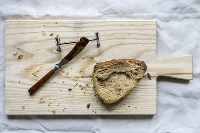 High angle view of bread on cutting board