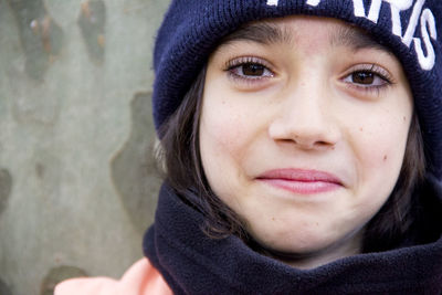 Close-up portrait of smiling girl