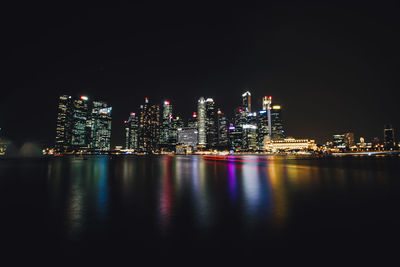 Illuminated city lit up at night