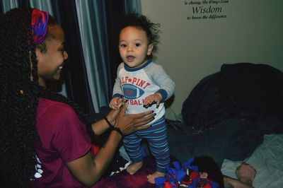 Cute baby girl in bedroom