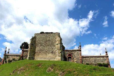 Low angle view of built structure against sky