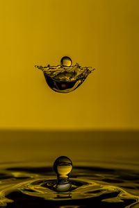 Close-up of water drop on table