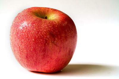 Close-up of apple against white background