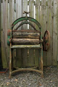 Old rusty metal wheel in abandoned building